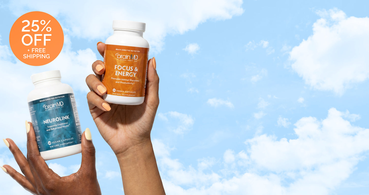 Two hands holding supplement bottles against a blue sky with promotional text.