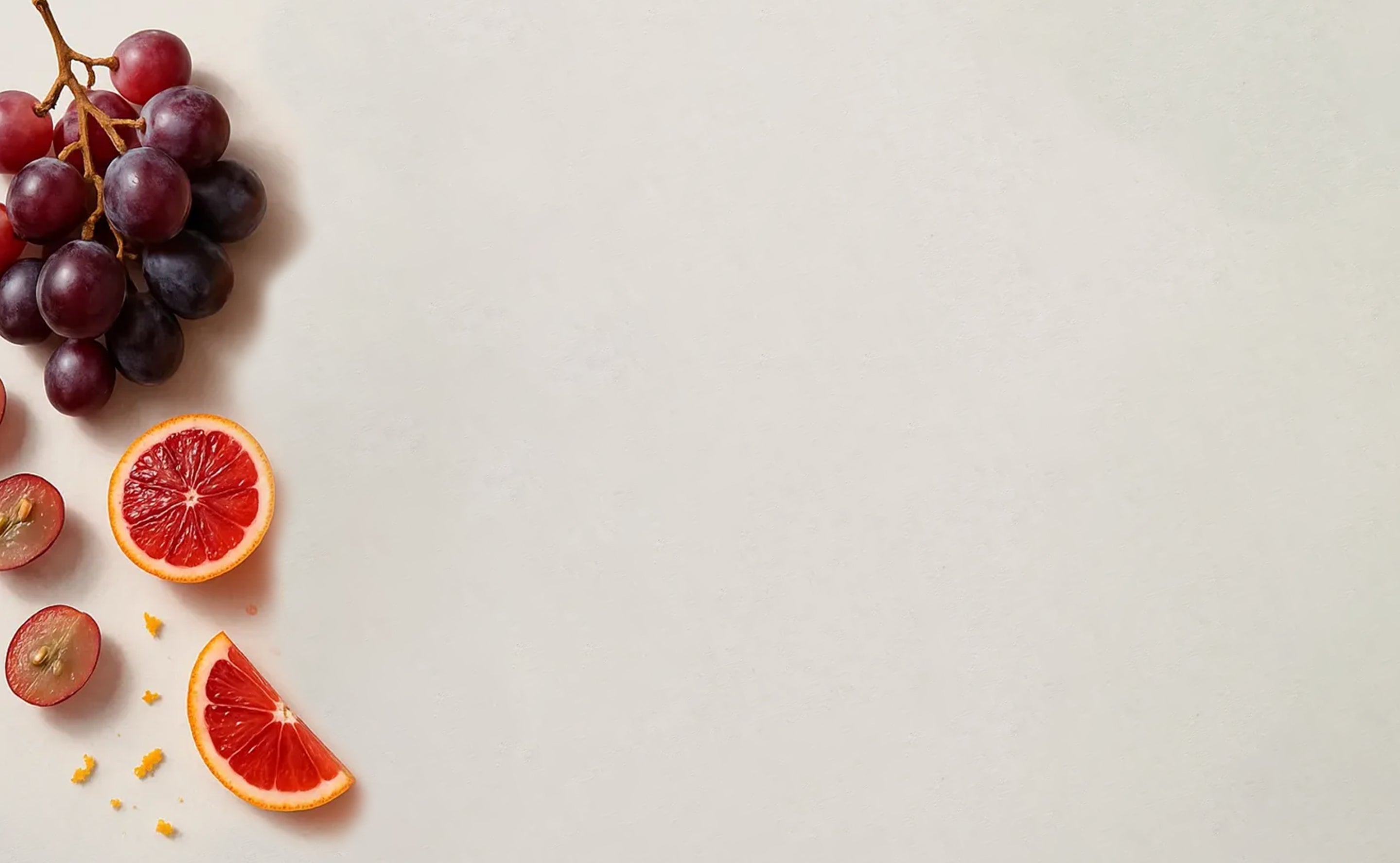 BrainMD Menopause Essentials+: image of natural fruit ingredients set against a white background