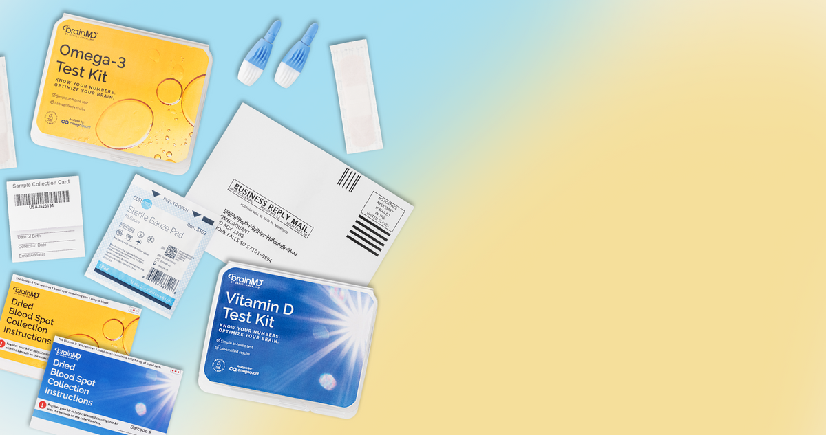 BrainMD Omega-3 Test Kit and Vitamin D Test Kit laid out with at-home collection supplies: lancets, bandage, gauze pad, sample collection card, instructions, and a prepaid return envelope.