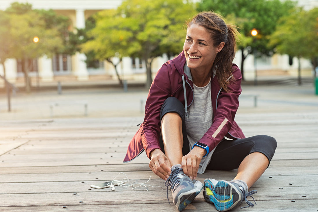 woman preparing to exercise, contemplating creatine for women