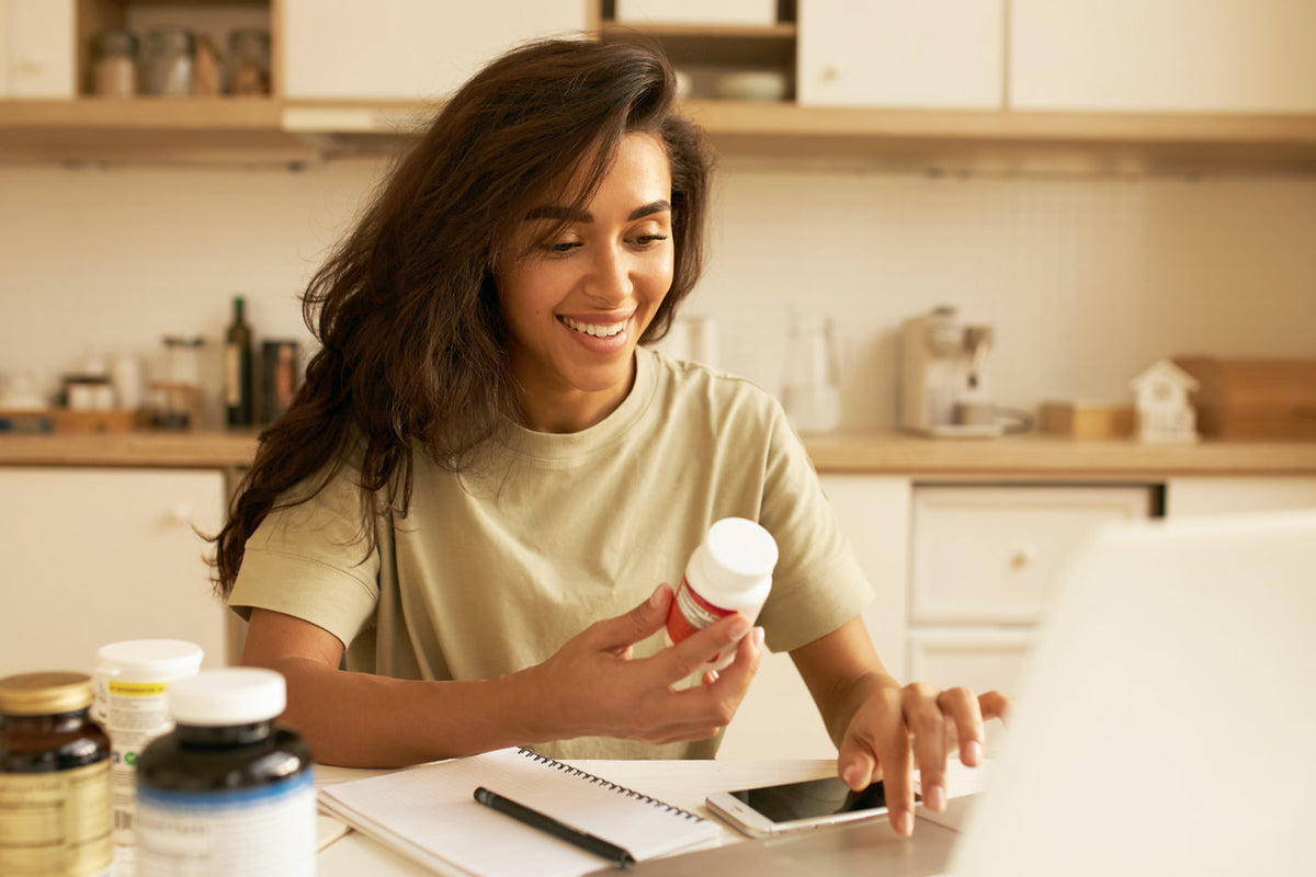 woman responsibly researching brain supplements