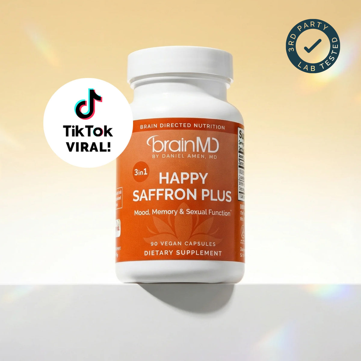 BrainMD Happy Saffron Plus supplement bottle with third-party lab tested badge, independently tested by Intertek