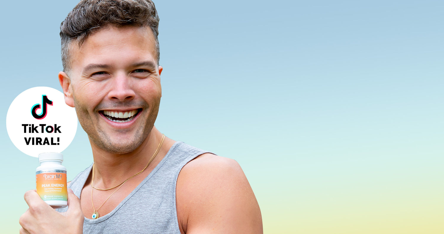 Man holding a bottle with TikTok logo and 'Viral!' text on a gradient background