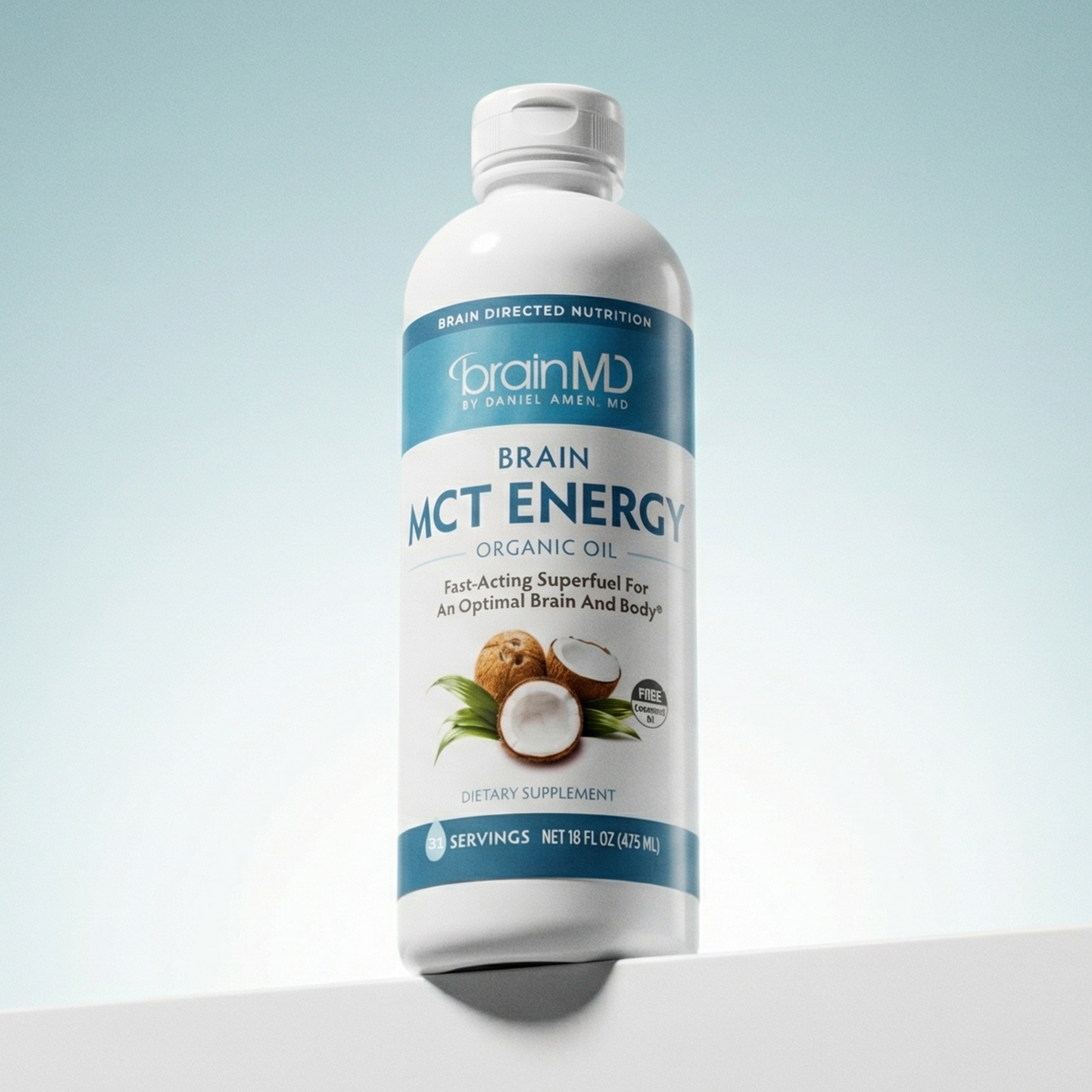 BrainMD MCT Energy organic oil bottle on a light blue background