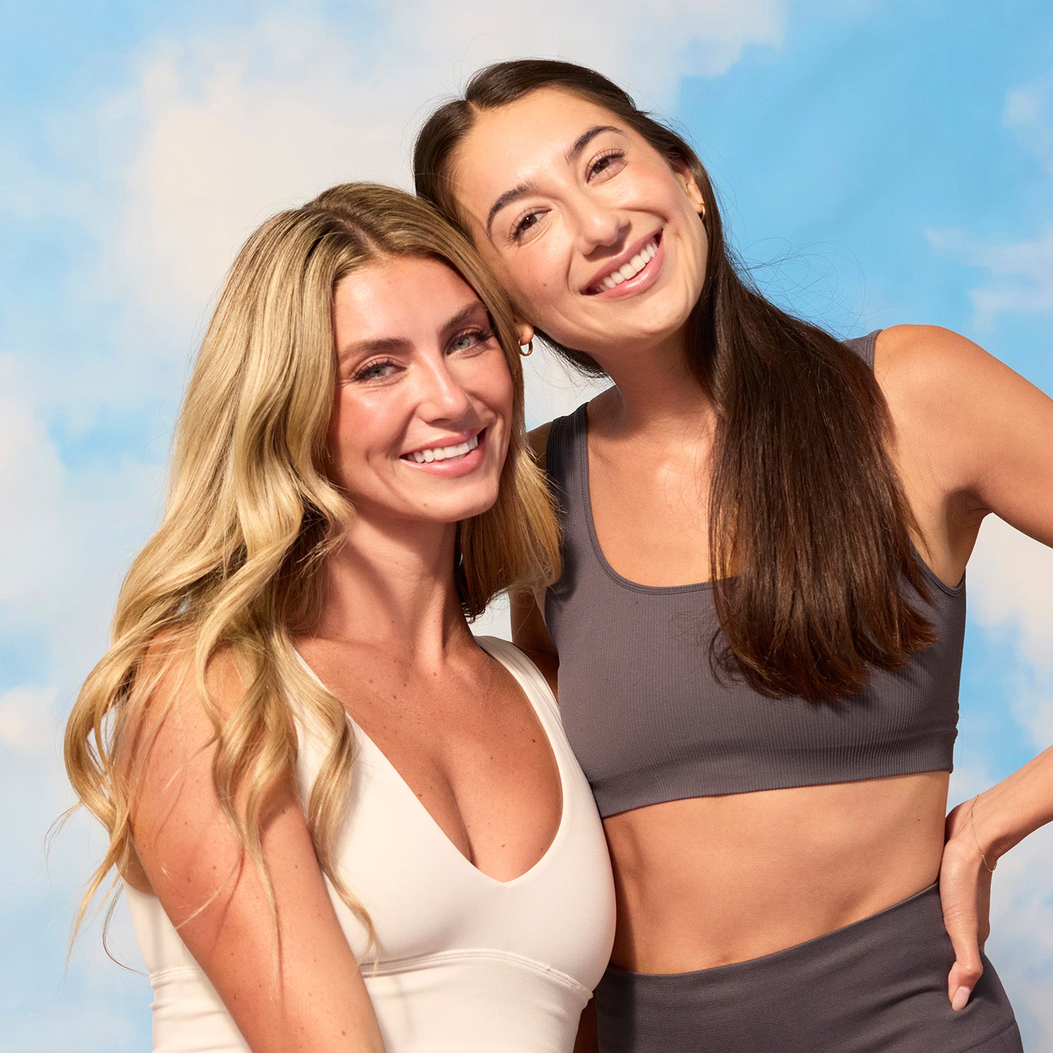 BrainMD Bundle Of Joy: two smiling women standing in front of a sky background