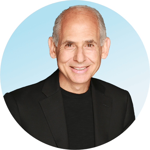 Circular image of Dr. Daniel Amen against a light blue background.