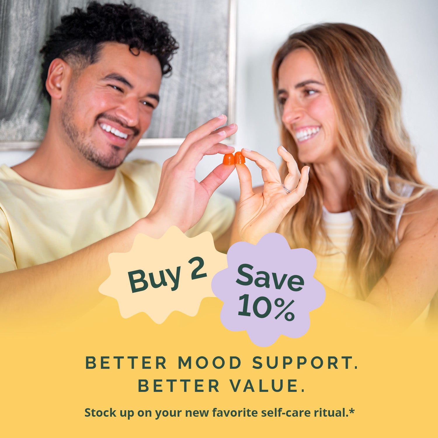 Man and woman holding a small object with promotional text overlay
