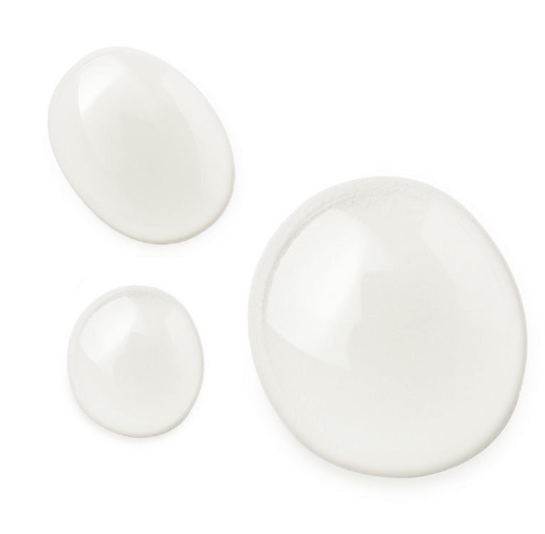 Three dollops of liquid glycerin against a white background.