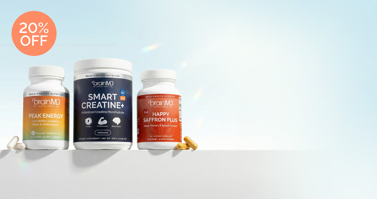 20% off Peak Energy, Smart Creatine+, and Happy Saffron Plus supplement bottles on a white ledge