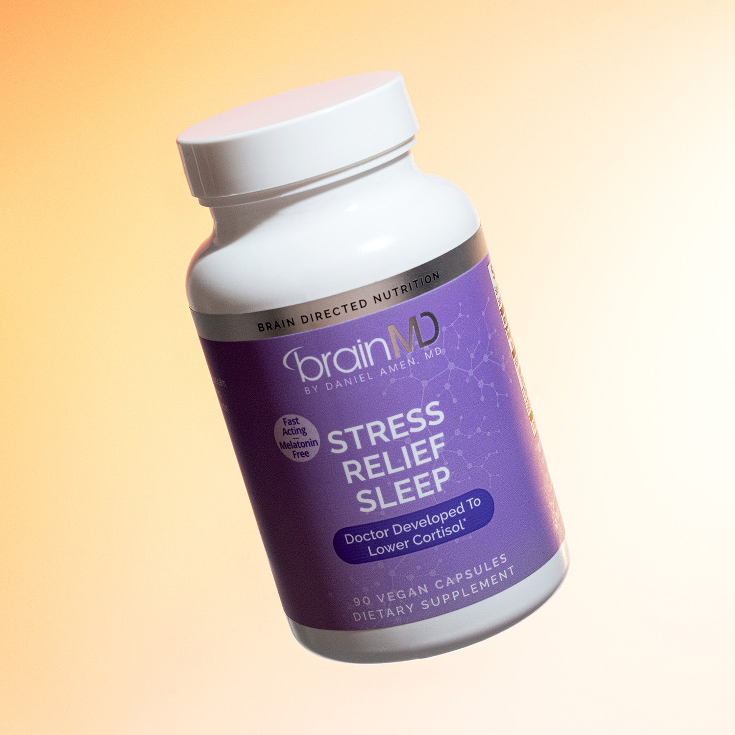 BrainMD Stress Relief Sleep: supplement bottle against a light yellow background