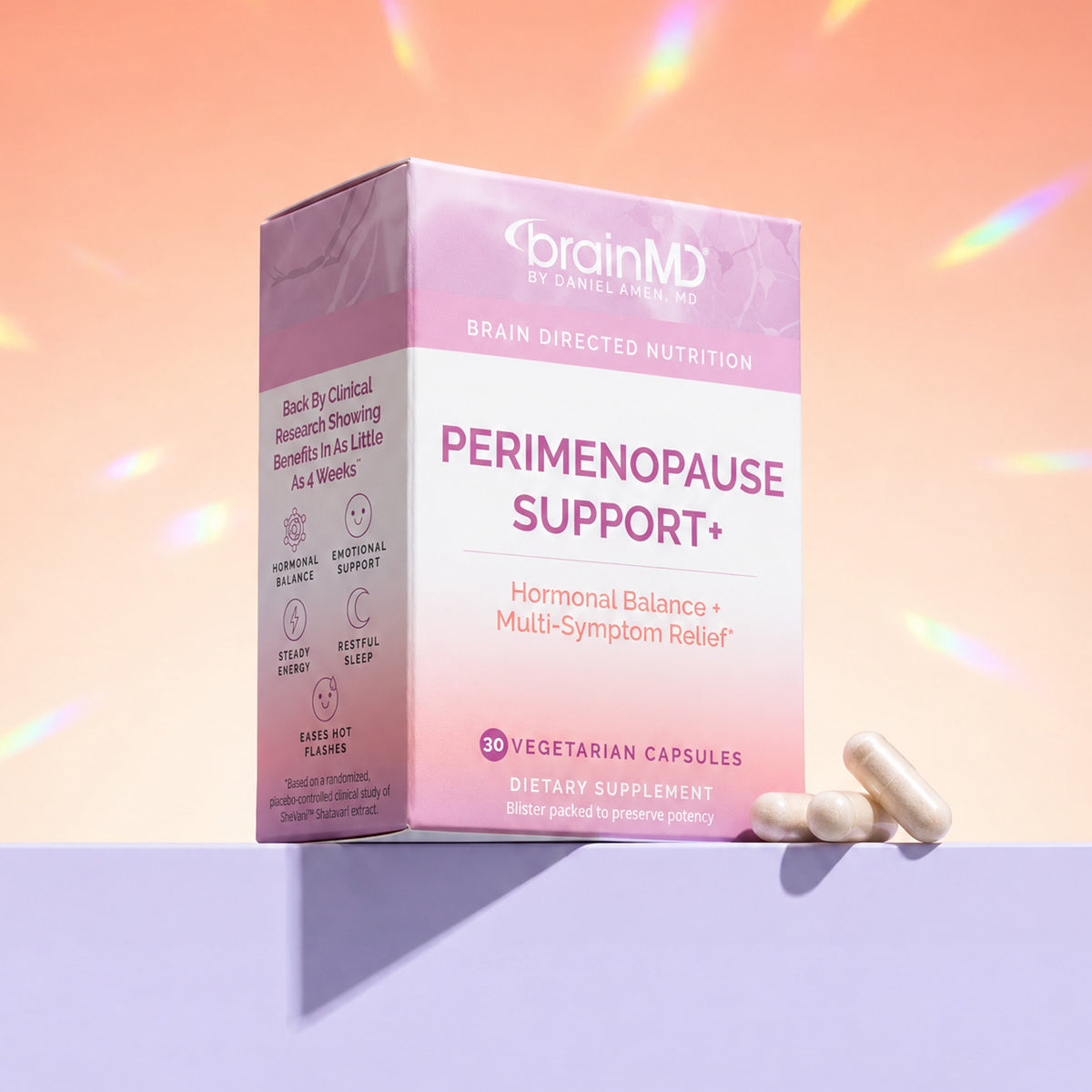 BrainMD Perimenopause Support+ perimenopause support supplement box with capsules on a lavender ledge
